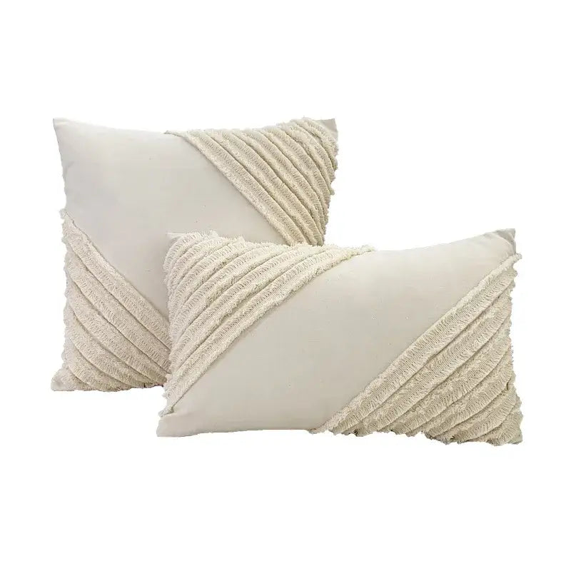 Cream-colored rectangular cushion cover with textured fringed fabric accents boho geometry fringed decorbites pillow