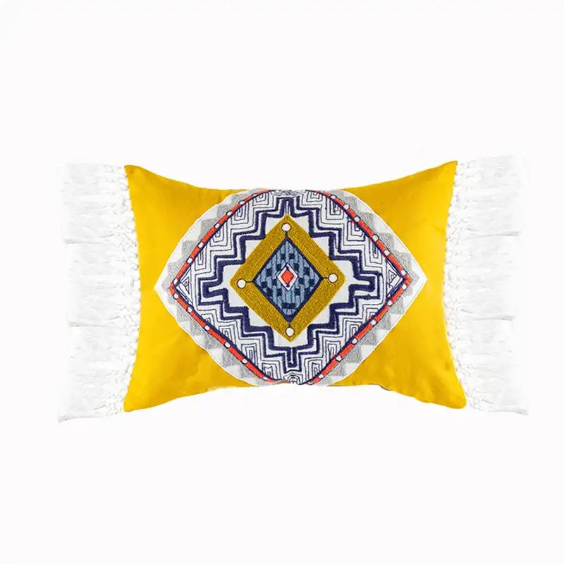 Vibrant yellow boho gold embroidered cotton pillow cover with geometric embroidery and white tassels for decorbites boho gold decor