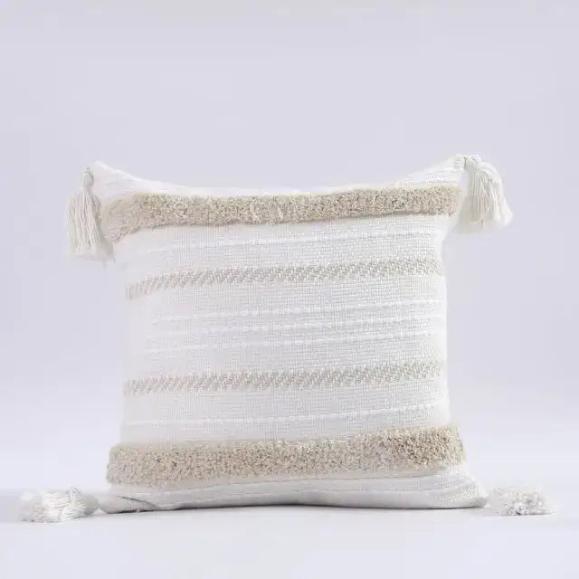 Boho morocco tufted cushion cover in white and beige with textured stripes and tassel decorbites boho morocco style