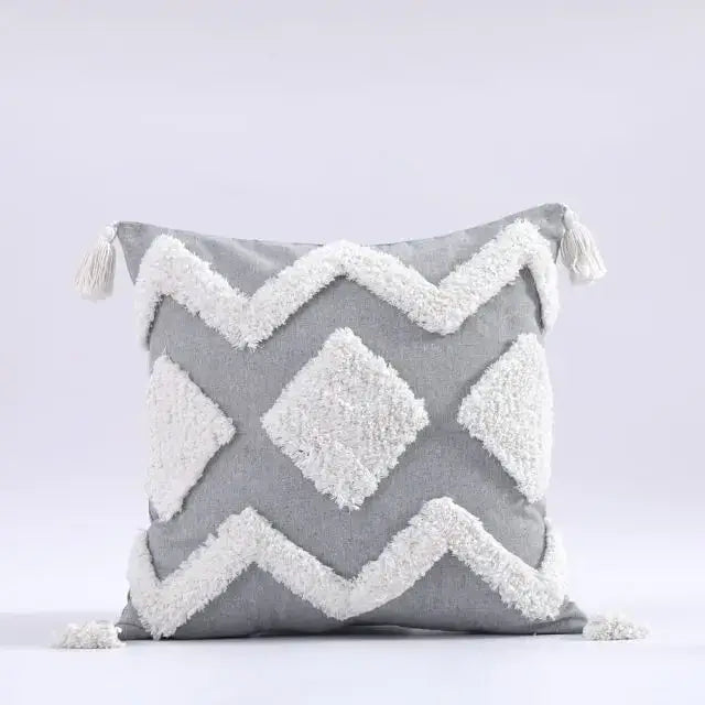 Gray cushion cover with white textured zigzag diamond patterns and tassels decorbites boho morocco tufted style
