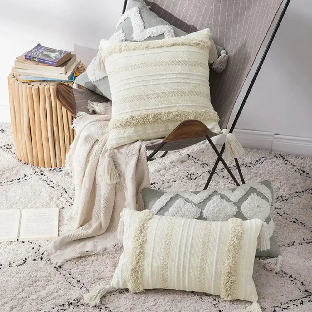 Cream-colored cushion cover with textured woven stripes and soft tassels for decorbites boho morocco tufted decor