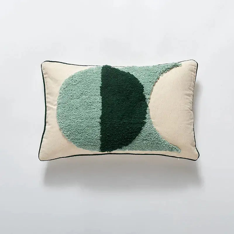 Cream-colored rectangular cushion cover with green split circle design for boho green and cream geometric decorbites blue tufted decor