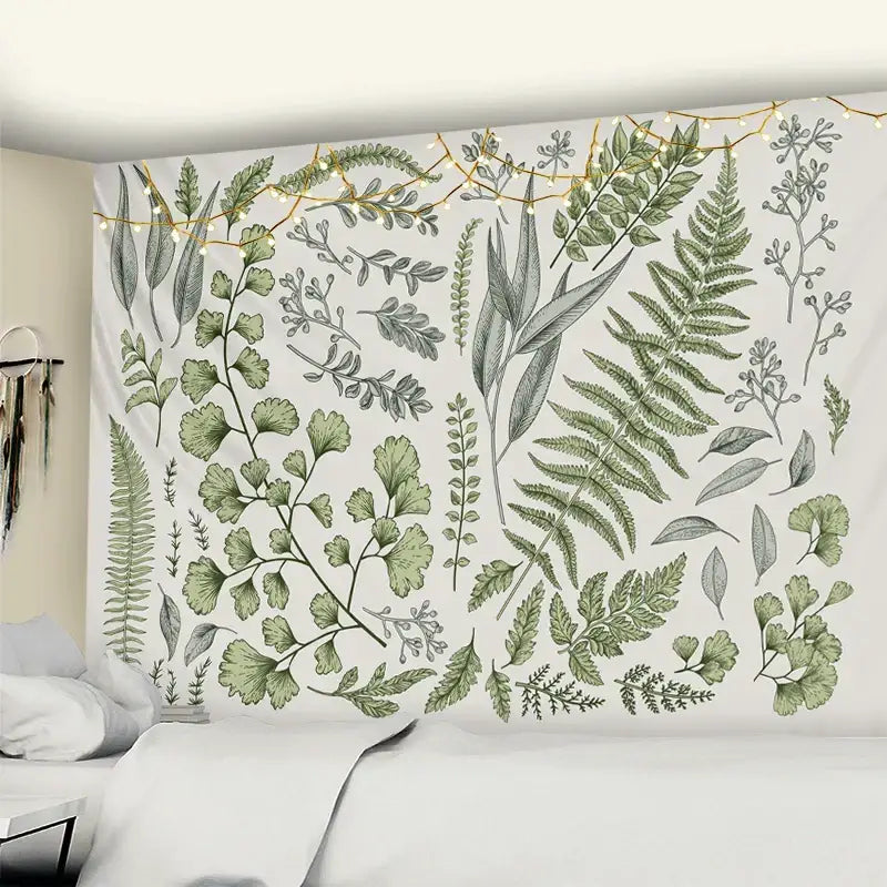 A white decorbites botanical tapestry wall hanging featuring green and gray leaf patterns for bedroom decor