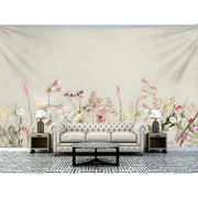 Beige tufted leather sofa with rolled arms and button detailing complementing decorbites boho green leaf tapestry wall hanging