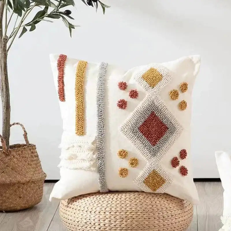 Cream-colored boho ivory brown pillow cover with terracotta and mustard yellow geometric textured decorbites boho ivory design