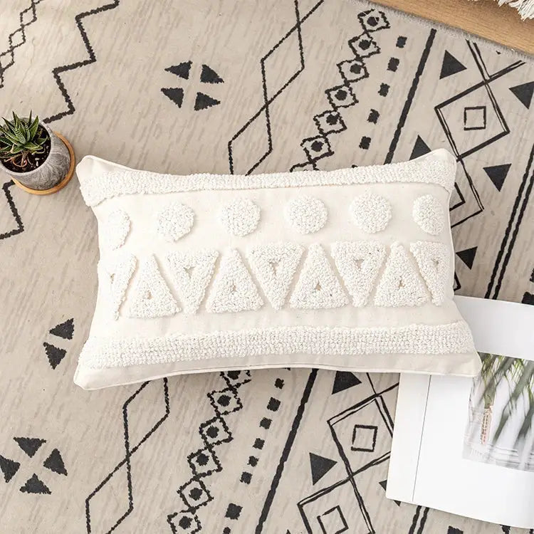 Cream-colored rectangular cushion cover with textured tufted geometric patterns in decorbites ivory cotton loop fabric