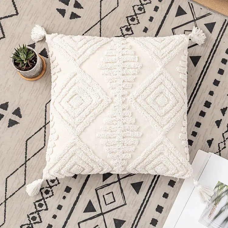 Cream-colored textured boho ivory cotton loop cushion cover with geometric embroidery and tassels for living room decorbites ivory cotton decor