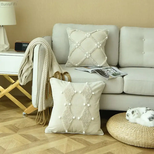 Beige boho ivory cushion cover with textured diamond appliqués and colorful pompoms for decorbites bedroom decor