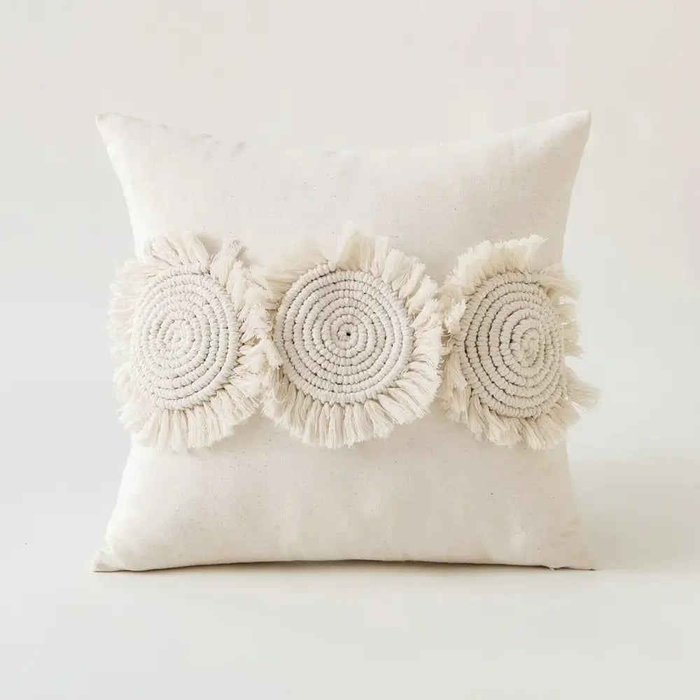 Cream-colored boho ivory cushion cover with handcrafted macrame circles and fringed edges for living room decorbites ivory cushion