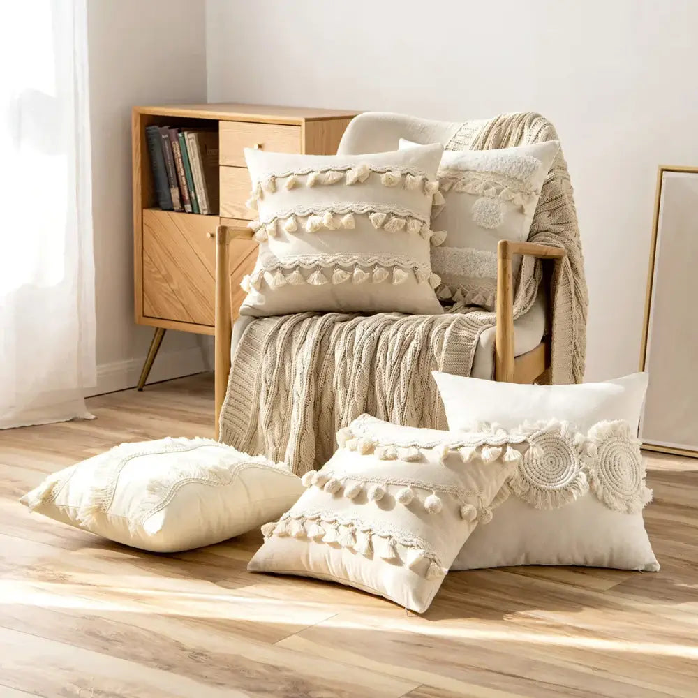 Cream-colored boho ivory cushion cover with textured tassels crochet accents and pompoms for living room sofa decorbites ivory cushion