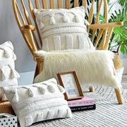 Boho ivory tufted tassel cushion cover with cream textured woven stripes and fluffy white tassels for living room decor