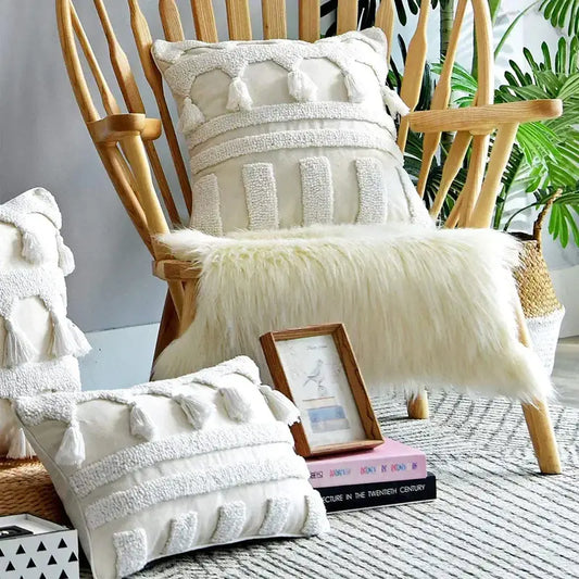 Boho ivory tufted tassel cushion cover with cream textured woven stripes and fluffy white tassels for living room decor