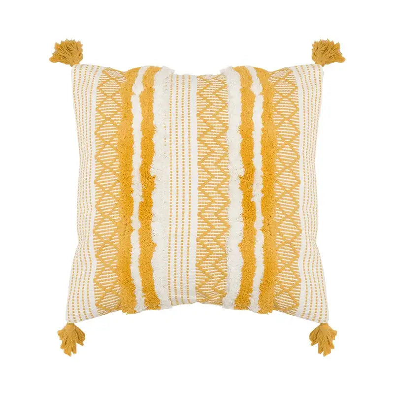 Cozy square boho jacquard cushion cover in mustard yellow and cream with woven vertical stripes and tassels by decorbites