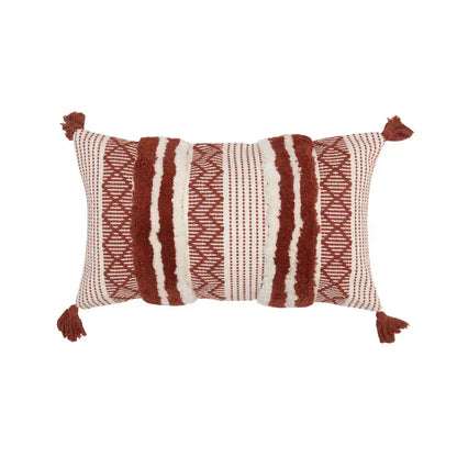 Rectangular boho jacquard cushion cover with rust and cream woven pattern and textured tassels for living room decorbites