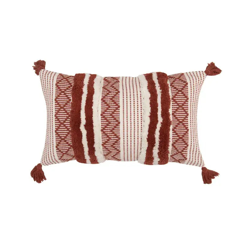 Rectangular boho jacquard cushion cover with rust and cream woven pattern and textured tassels for living room decorbites