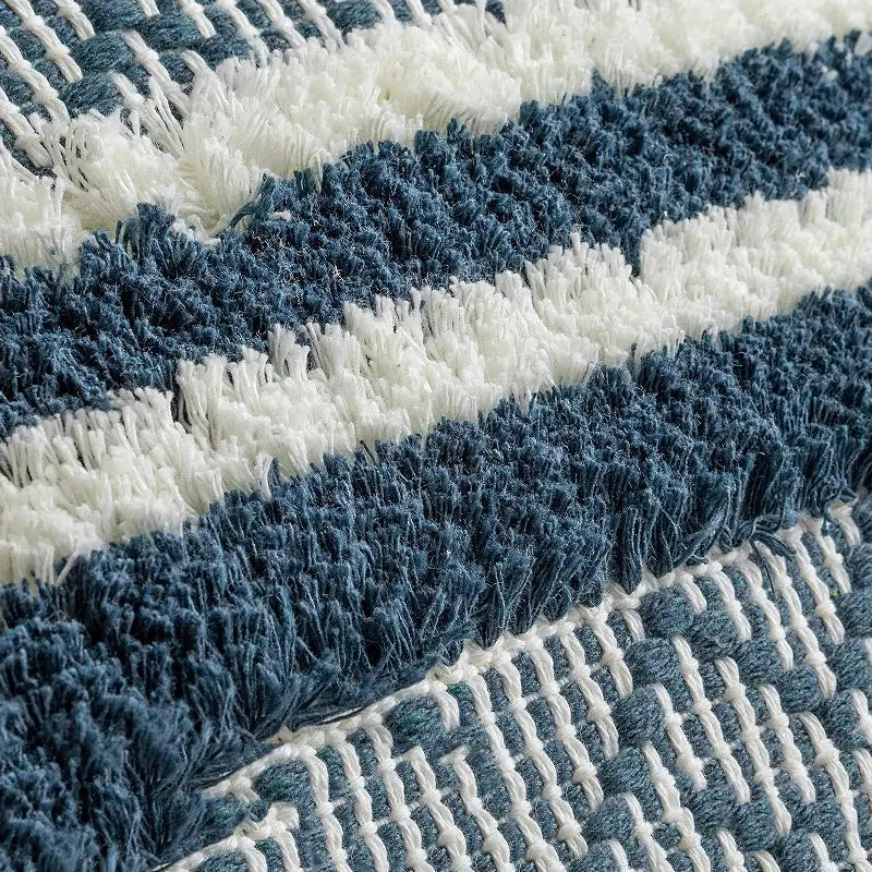 Blue and white striped shaggy rug with textured woven pattern complementing decorbites boho jacquard cushion cover
