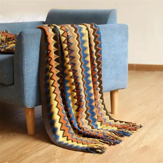 Decorbites boho knitted striped blanket in yellow blue orange and brown with fringed edges for living room decor