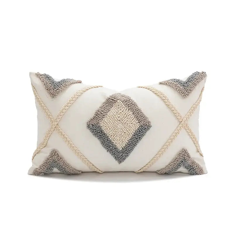 Cream-colored rectangular boho loop tufted pillow cover with textured gray and beige geometric embroidery decorbites boho loop