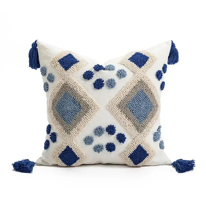 Cream-colored boho loop tufted pillow cover with blue gray geometric embroidery tassels and pom-poms decorbites boho loop