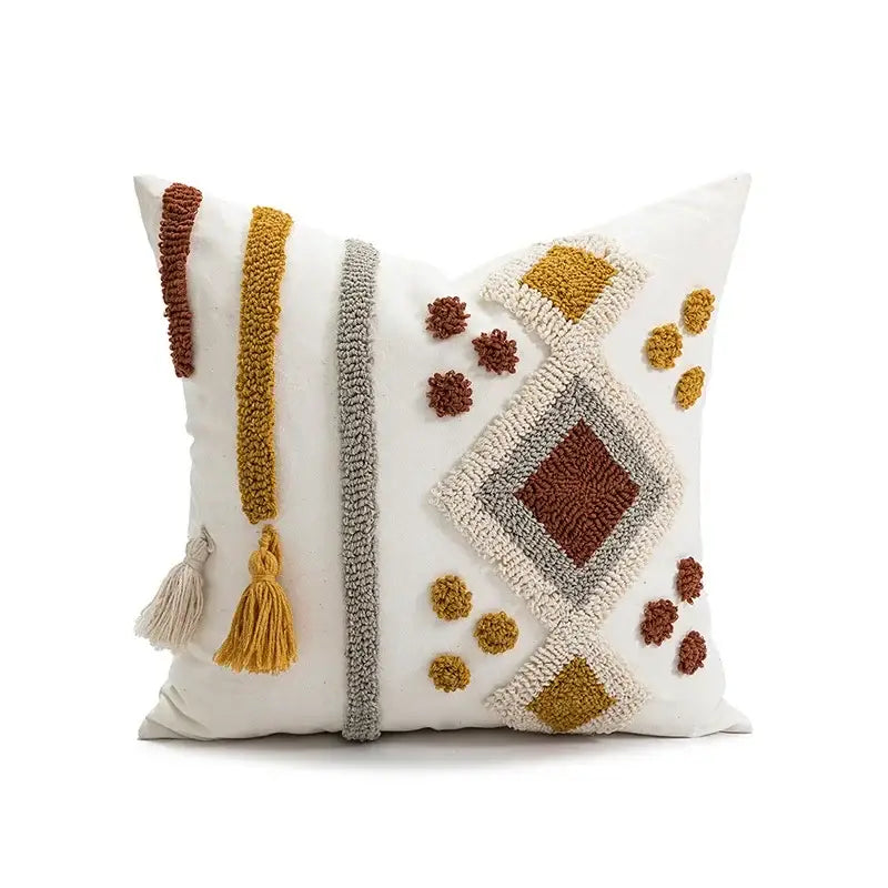 White boho loop tufted pillow cover with textured geometric pattern in terracotta and mustard yellow with tassels by decorbites