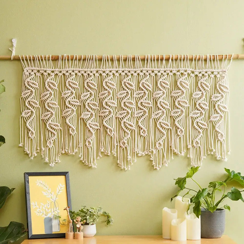 Cream-colored boho macrame tapestry curtain with intricate leaf pattern knots and fringe for bedroom decorbites boho macrame decor