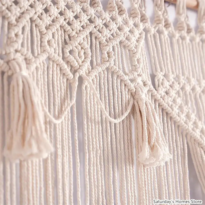 Cream-colored decorbites boho macrame tassel curtain with intricate knotwork and tassels for living room decor