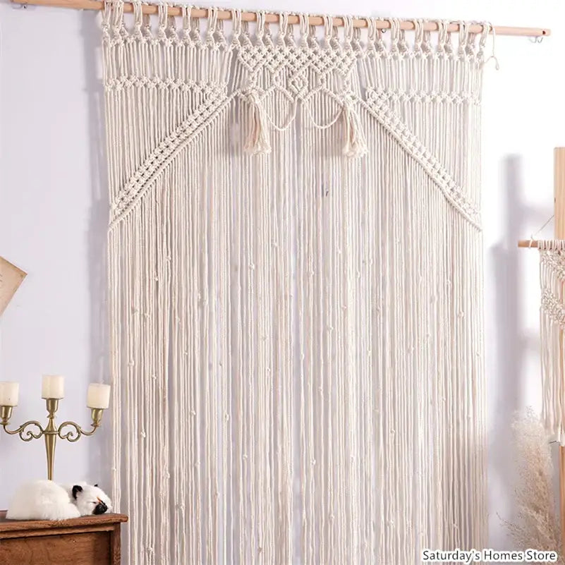 Cream-colored decorbites boho macrame tassel curtain featuring intricate knotwork and tassels for living room decor