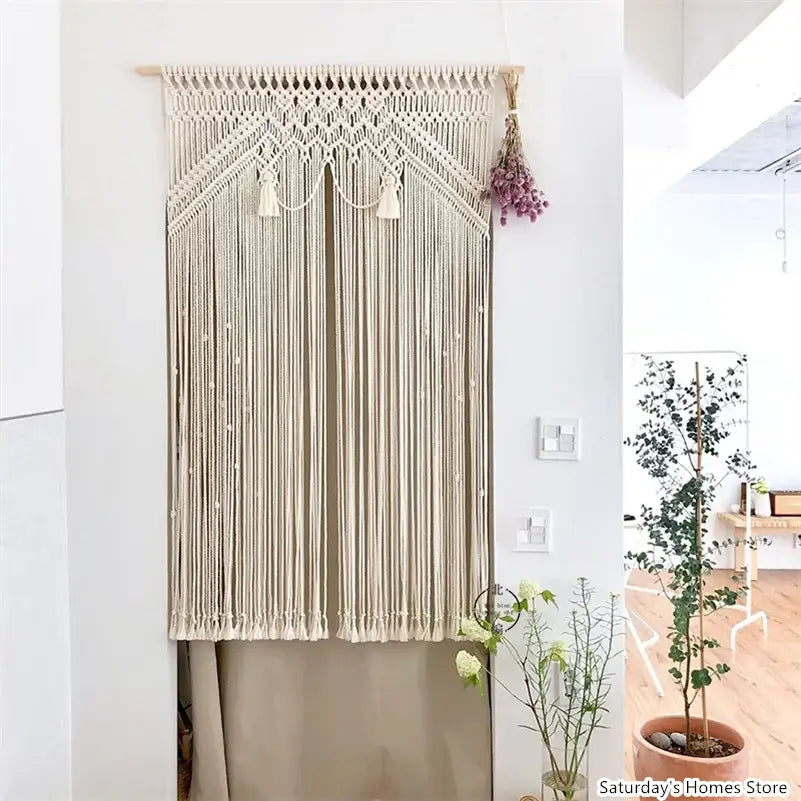 Cream-colored decorbites boho macrame tassel curtain with intricate woven patterns and decorative tassels for window decor