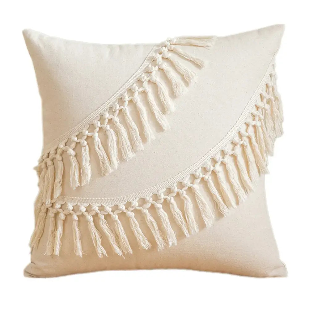 Cream cotton cushion cover with two diagonal rows of macrame tassels from decorbites boho macrame woven collection