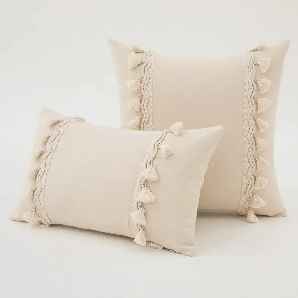 Cream-colored cotton cushion cover with decorative tassel trim decorbites boho macrame woven bedroom pillow