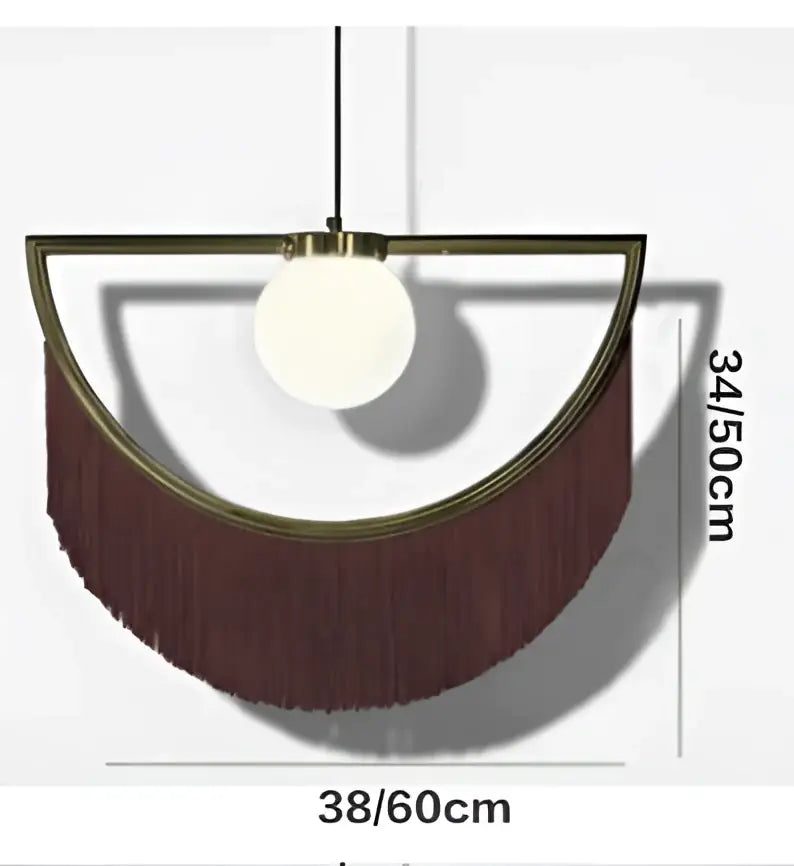 Modern semi-circular pendant light with brass frame, frosted glass ball pendant, and deep brown fringe curtain for bedroom
