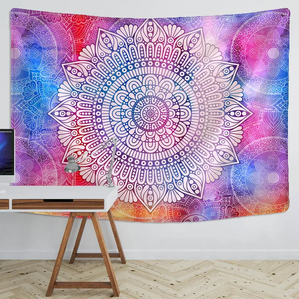 A vibrant gradient-colored boho indian mandala tapestry with intricate white line art for bedroom wall decor