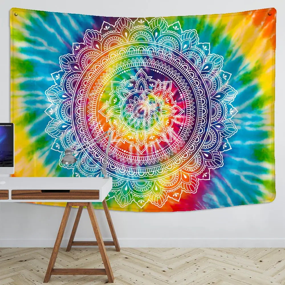 A vibrant rainbow tie-dye indian mandala tapestry with intricate white line art for boho bedroom decor