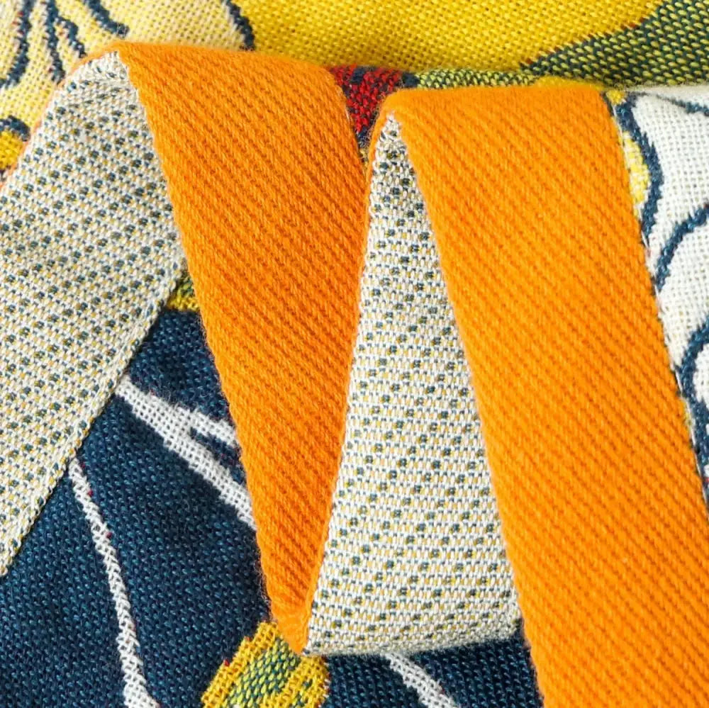 Bright orange woven cotton bath towel straps with textured diagonal weave for boho navy yellow bathroom decorbites decor