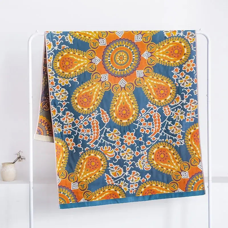 Boho navy and yellow decorbites cotton bath towel with vibrant orange and teal paisley floral pattern for bathroom decor