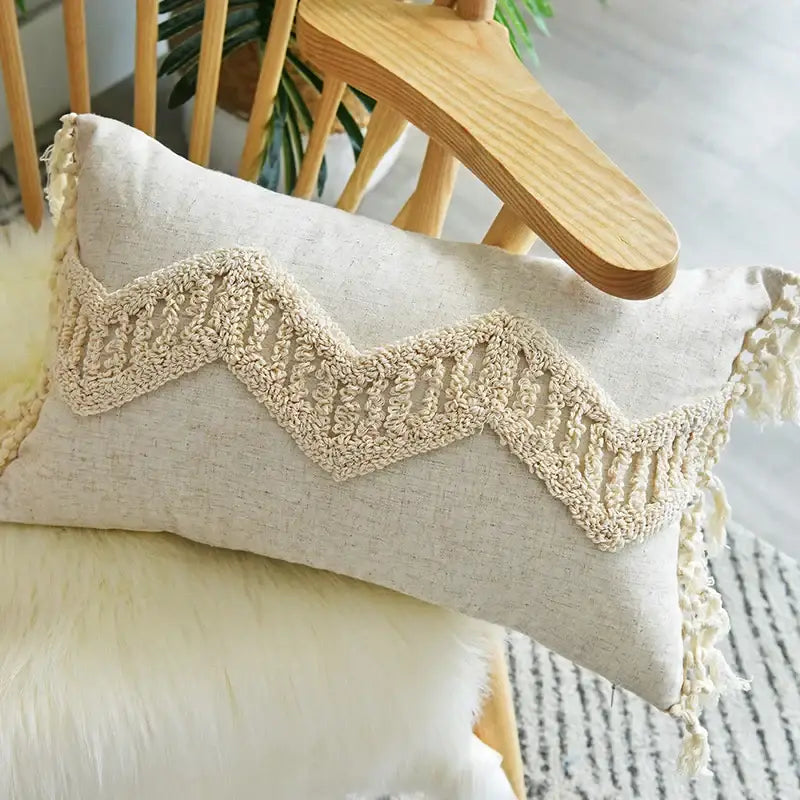 Beige cotton pillow case with textured cream crocheted zigzag band and fringe decorbites boho nordic tassel design