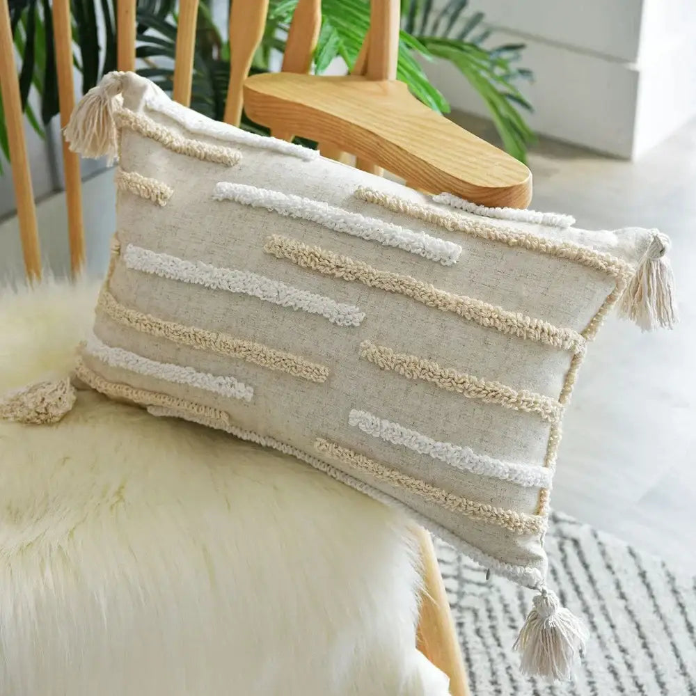 Beige cotton boho nordic tassel pillow case with textured cream stripes and matching tassels for bedroom decorbites decor