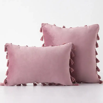 Soft blush pink velvet pillow covers with tassel fringe detail perfect for boho living room home decor