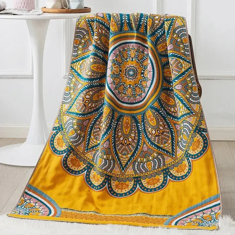 A vibrant yellow velvet bath towel with an intricate multicolored mandala design by decorbites cotton gauze bath wrap
