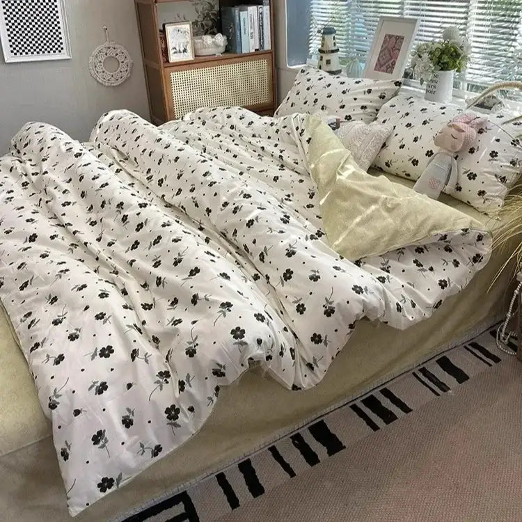 White cotton duvet cover with black floral boho pattern printed and small dots from decorbites bedding set