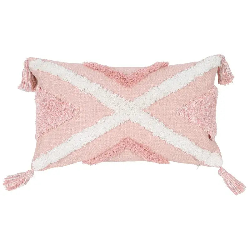 Bohobites boho pink geometric pillow covers featuring a pink rectangular throw pillow with white cross fringe and tassels