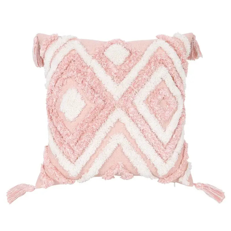 Boho pink geometric tufted pillow covers in pink and white with tassels for stylish bedroom decor by decorbites boho pink