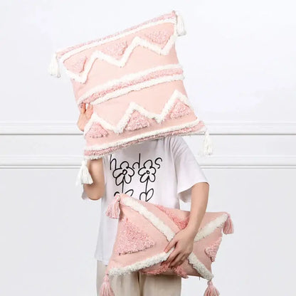 Boho pink geometric pillow covers with pink and white textured fabric and tassels for decorbites boho pink bedroom decor