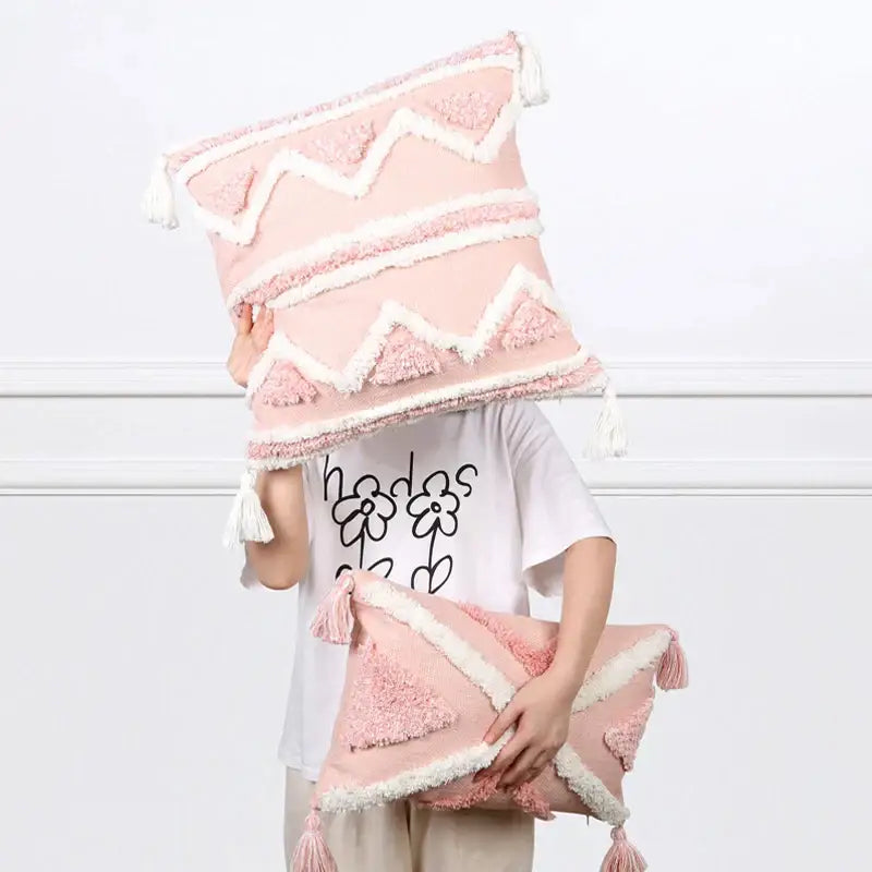 Boho pink geometric pillow covers with pink and white textured fabric and tassels for decorbites boho pink bedroom decor