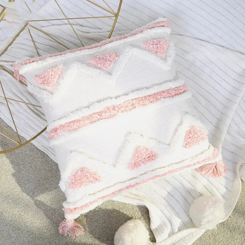 Cozy boho pink geometric pillow covers with white and pink textured fabric, fluffy pom-poms, perfect for bedroom decorbites boho pink decor