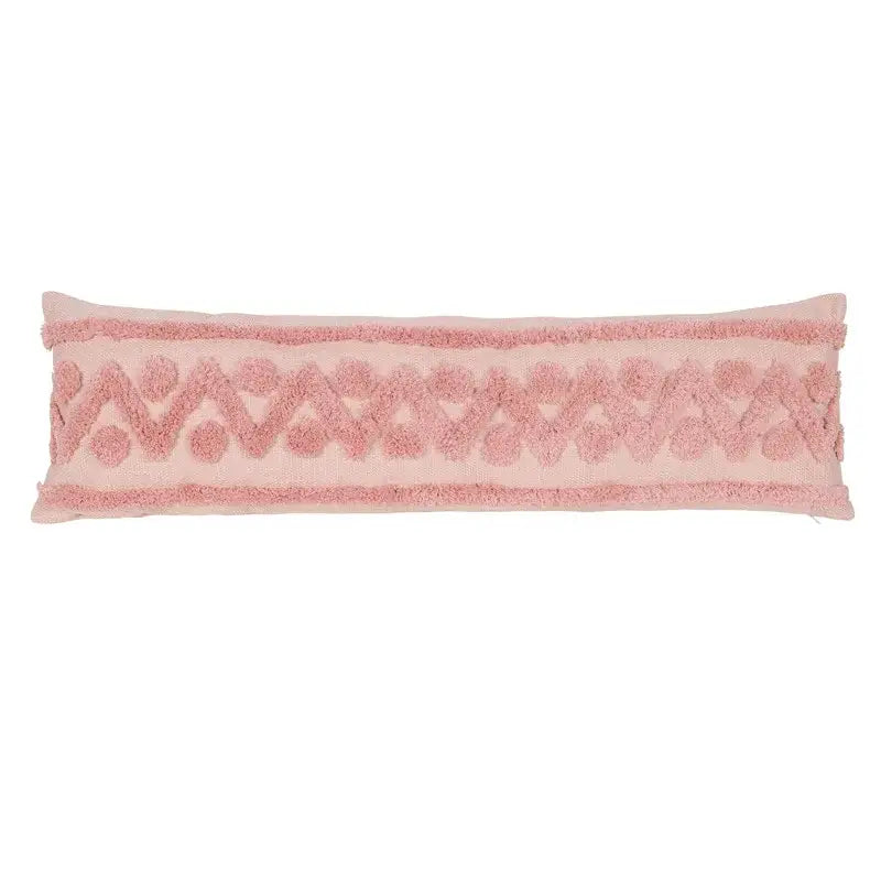 A soft pink boho pink geometric long rectangular pillow cover with textured embroidery and fringed edges for decorbites decor