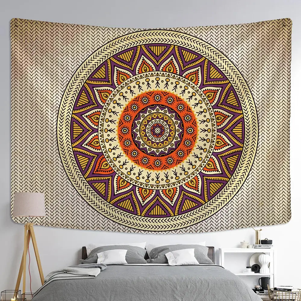 A vibrant boho rainbow indian mandala wall hanging tapestry with orange purple and beige geometric lace patterns
