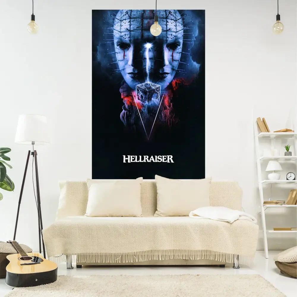 Boho red and blue jack-o-lantern wall tapestry featuring a dark blue hellraiser design with glowing eyes above a beige sofa decorbites wall tapestry