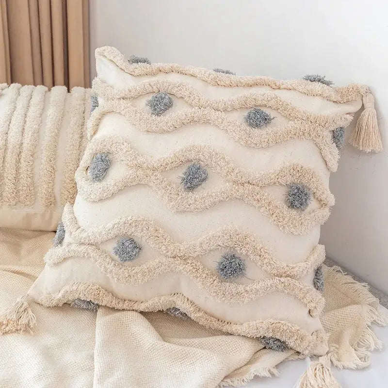 Cream-colored decorbites boho square pillowcase with textured wavy fringe gray pom-poms and teal tassels for living room decor