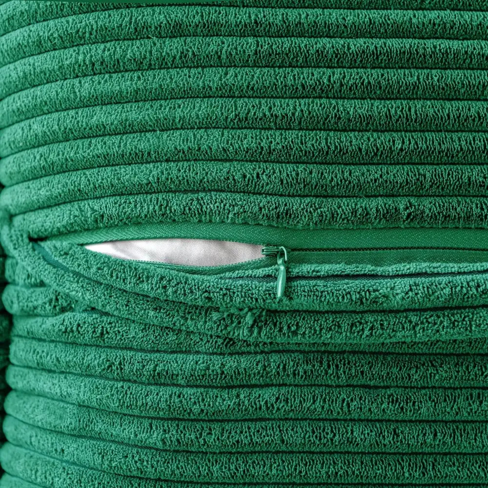 Deep green corduroy boho striped pillow cover with visible zipper pull for living room decor use
